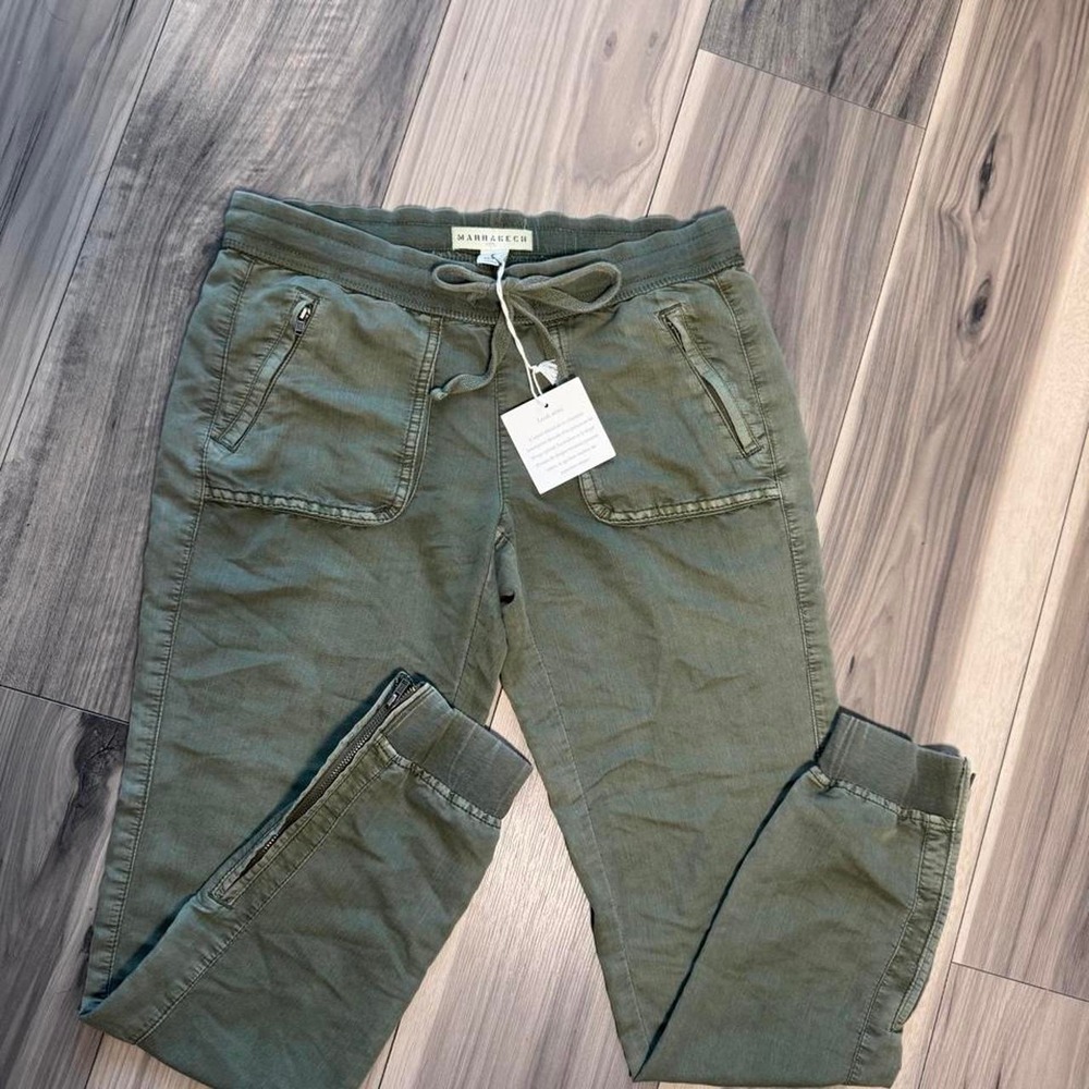 Marrakech olive green cargo pants with adjustable waistband and pockets. New